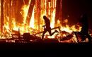 Burning Man festival horror as man dodges firefighters and dives into flames