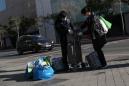 Spain toughens restrictions as coronavirus death toll surges