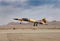 Eyeing U.S., Iran says to boost military might, showcases new fighter jet