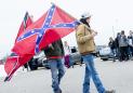 The Latest: Student: Confederate flag theft sparked protests