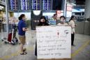 Hong Kong protesters offer apologies, China doubles down after airport clash