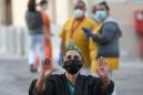 Spanish virus lockdown prolonged as toll tops 20,000