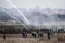 Tear gas sprayed across migrants at Turkey-Greece border