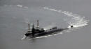 North Korea stages large-scale artillery drill as U.S. submarine docks in South