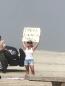 Police arrest 3 people protesting closed beaches at SoCal beach set to reopen Monday