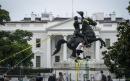 Protestors try to topple president's statue outside White House